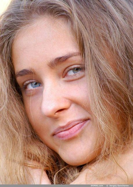 Thin teen Irah poses naked in the forest and shows her tiny tits and ass