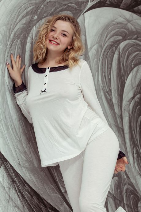 Blonde teen Daniel Sea removes her lingerie to pose nude