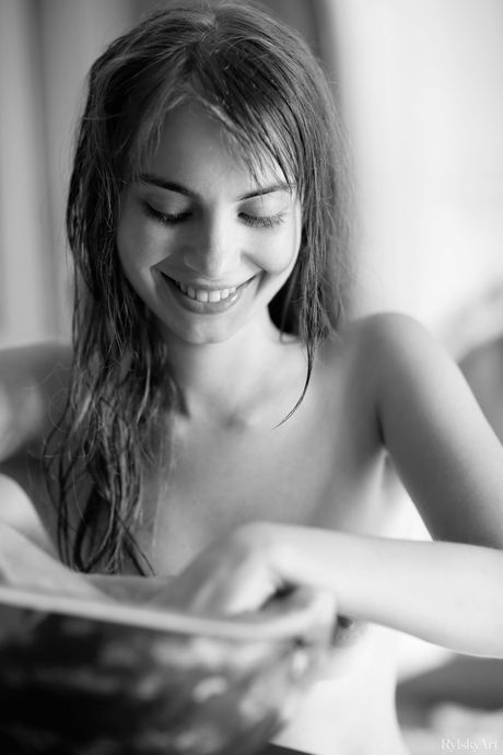 Lean teen Ella Moro strips naked & poses seductively by the pool