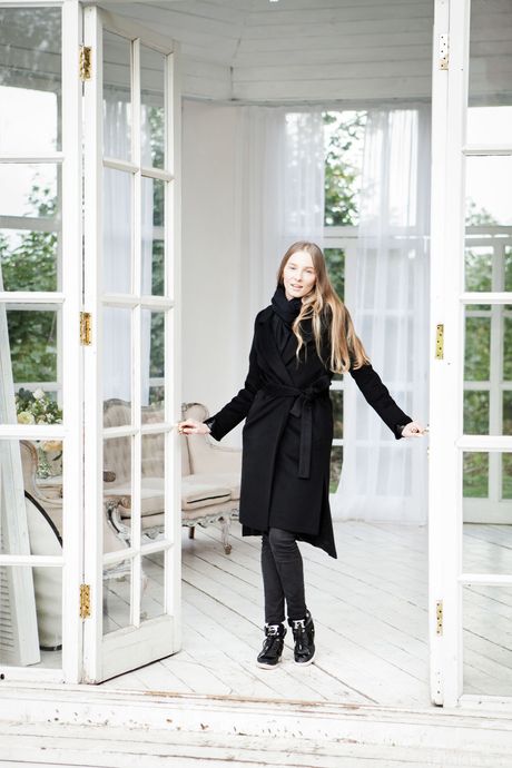 Alluring teen Nimfa removes black lingerie to pose nude in a garden