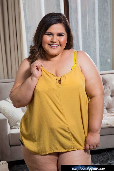 Big titted brunette Karla Lane shows her big ass and tasty pussy