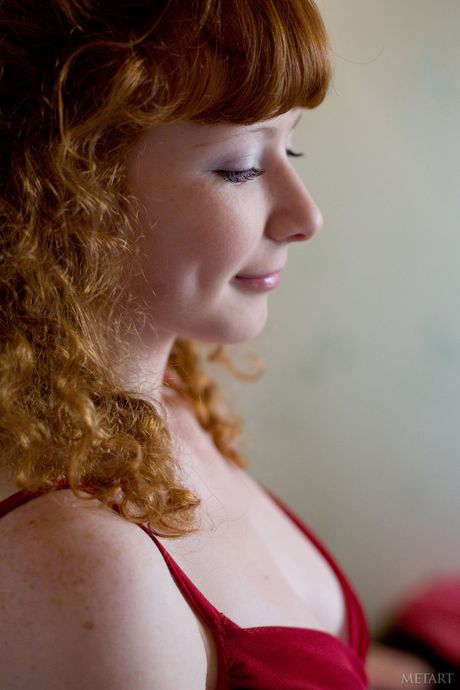 Lean teen Rochelle A exhibits her small tits and poses in white stockings