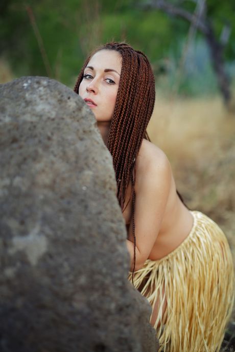 Skinny teen Night A strips and poses in the forest