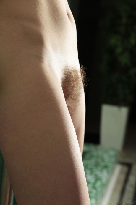 Winsome teen Sofi Shane gets naked in a pool before showing her bush