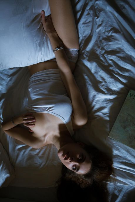 Beautiful teen Emily J uncovers her big tits and bald pussy in a solo